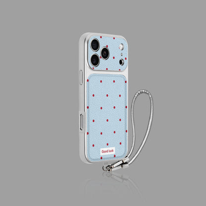 손목 스트랩 옵션이 있는 물방울무늬 가죽 iPhone 케이스